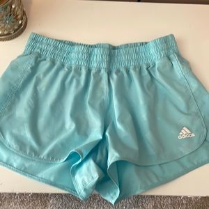 light blue size medium Adidas shorts in perfect condition.
